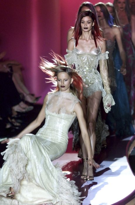 models falling on the catwalk