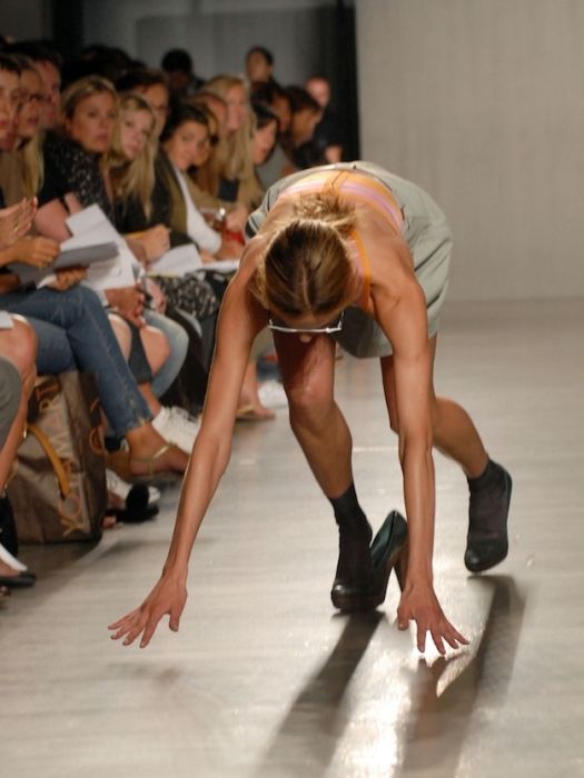 models falling on the catwalk