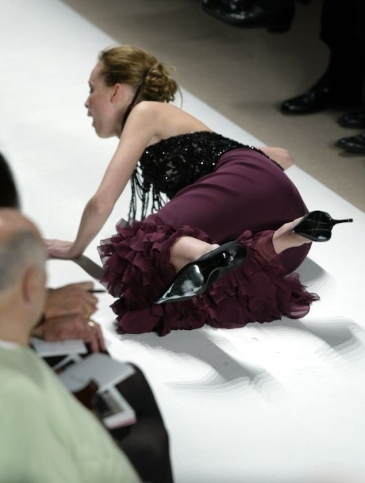 models falling on the catwalk