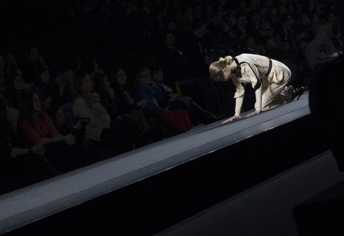 models falling on the catwalk