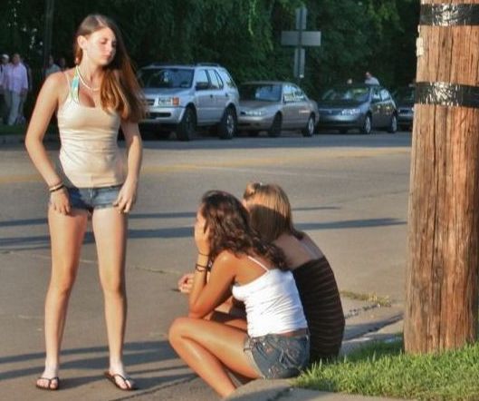 young girl in jean shorts