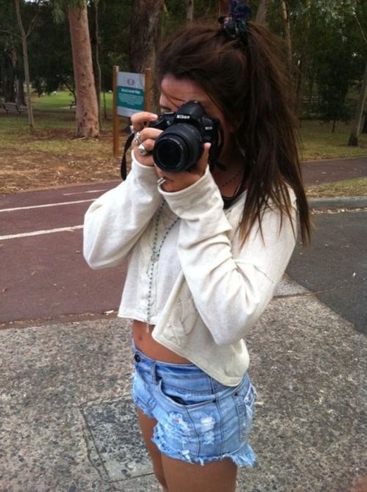 young girl in jean shorts