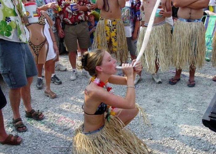 young girl with a beer bong