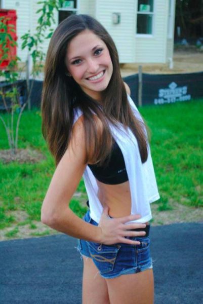 young girl in jean shorts