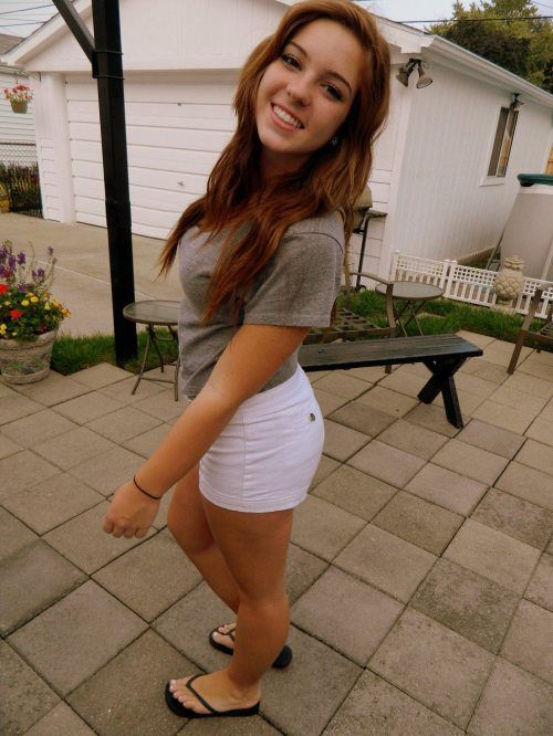 young girl in jean shorts