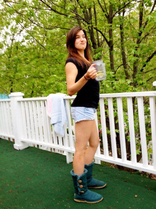 young girl in jean shorts