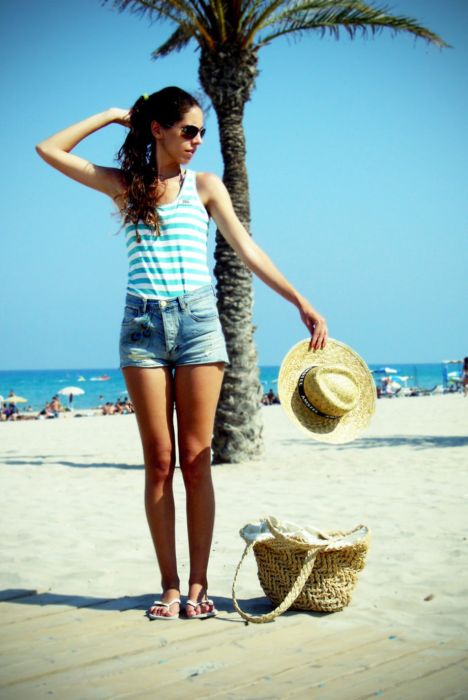 young girl in jean shorts