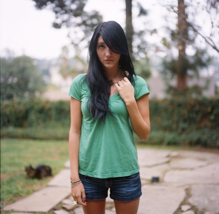 young girl in jean shorts