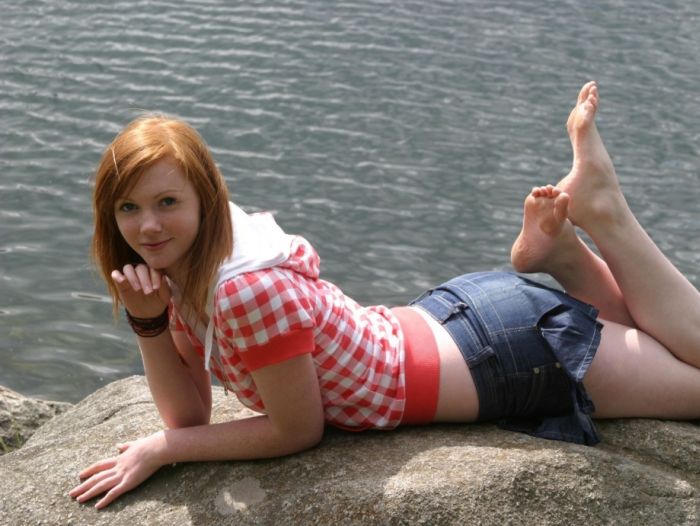 young girl in jean shorts