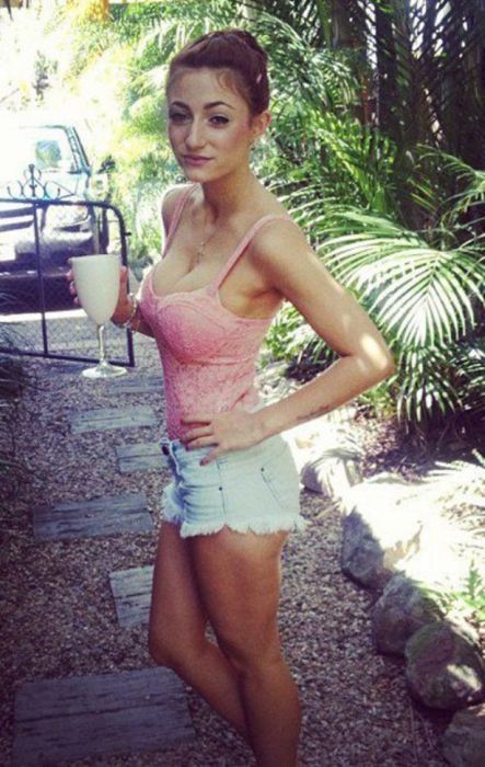 young girl in jean shorts