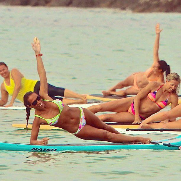 paddle board yoga surfing girl