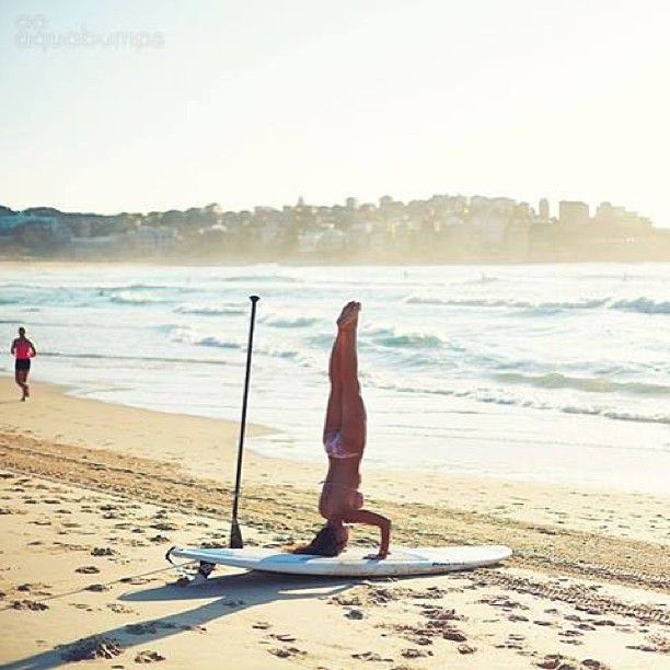 paddle board yoga surfing girl