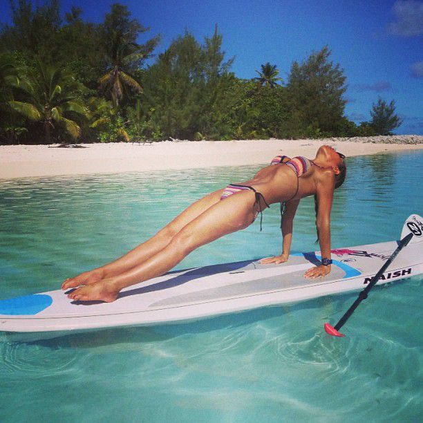 paddle board yoga surfing girl