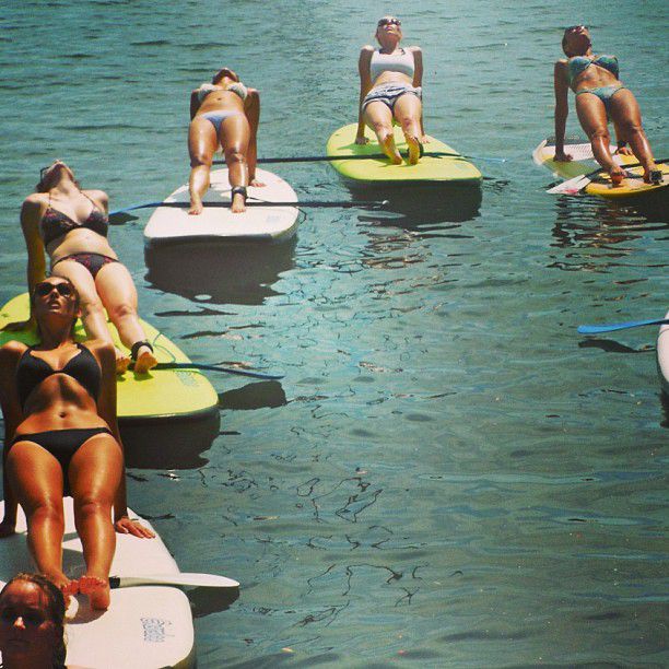 paddle board yoga surfing girl