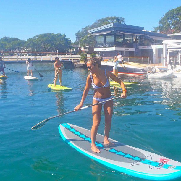 paddle board yoga surfing girl