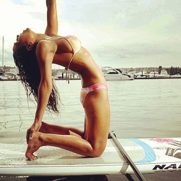 paddle board yoga surfing girl