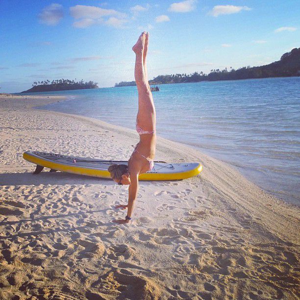 paddle board yoga surfing girl