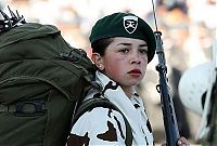 People & Humanity: girl in a military