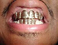 People & Humanity: teeth holder jewelry around the world