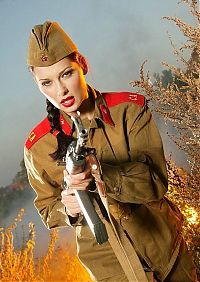 People & Humanity: girl with a gun