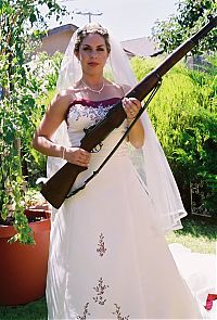 People & Humanity: girl with a gun