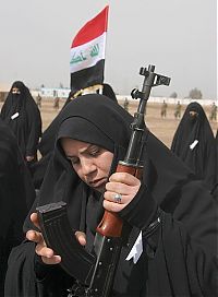 People & Humanity: girl with a gun