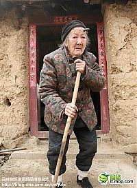 People & Humanity: Grandmother with unicorn, Zhang Ruifang, Henan Province, China