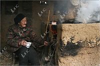 People & Humanity: Grandmother with unicorn, Zhang Ruifang, Henan Province, China