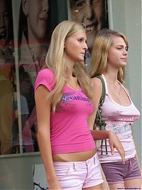 People & Humanity: two cute young blonde girls enjoying warm weather