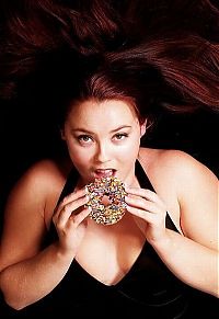 People & Humanity: girl eating doughnut