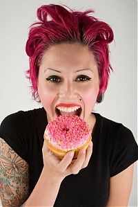 People & Humanity: girl eating doughnut