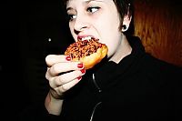 People & Humanity: girl eating doughnut