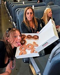 People & Humanity: girl eating doughnut