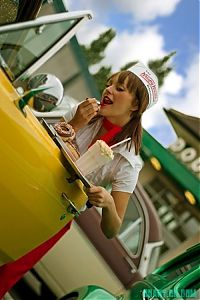 People & Humanity: girl eating doughnut