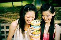 People & Humanity: girl eating doughnut