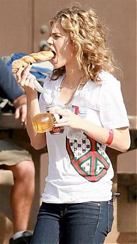 People & Humanity: girl eating doughnut