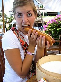 People & Humanity: girl eating hot dog