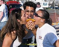 People & Humanity: girl eating hot dog