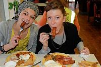 People & Humanity: girl eating hot dog