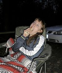 People & Humanity: girl eating hot dog