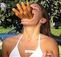 People & Humanity: girl eating hot dog