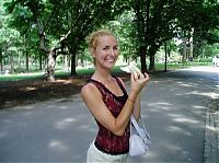 People & Humanity: girl eating hot dog