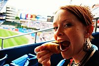 People & Humanity: girl eating hot dog