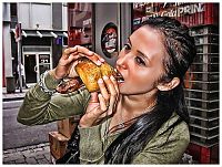 People & Humanity: girl eating hot dog