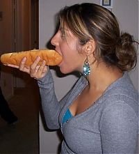 People & Humanity: girl eating hot dog