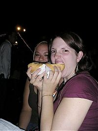 People & Humanity: girl eating hot dog