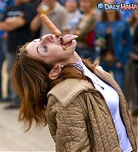 People & Humanity: girl eating hot dog