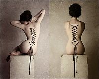 TopRq.com search results: girl with a corset piercing and extreme body modifications