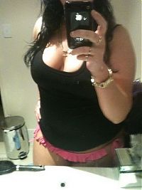 TopRq.com search results: young teen girl taking pictures in a mirror with iphone