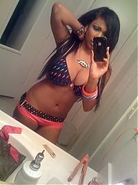 TopRq.com search results: young teen girl taking pictures in a mirror with iphone